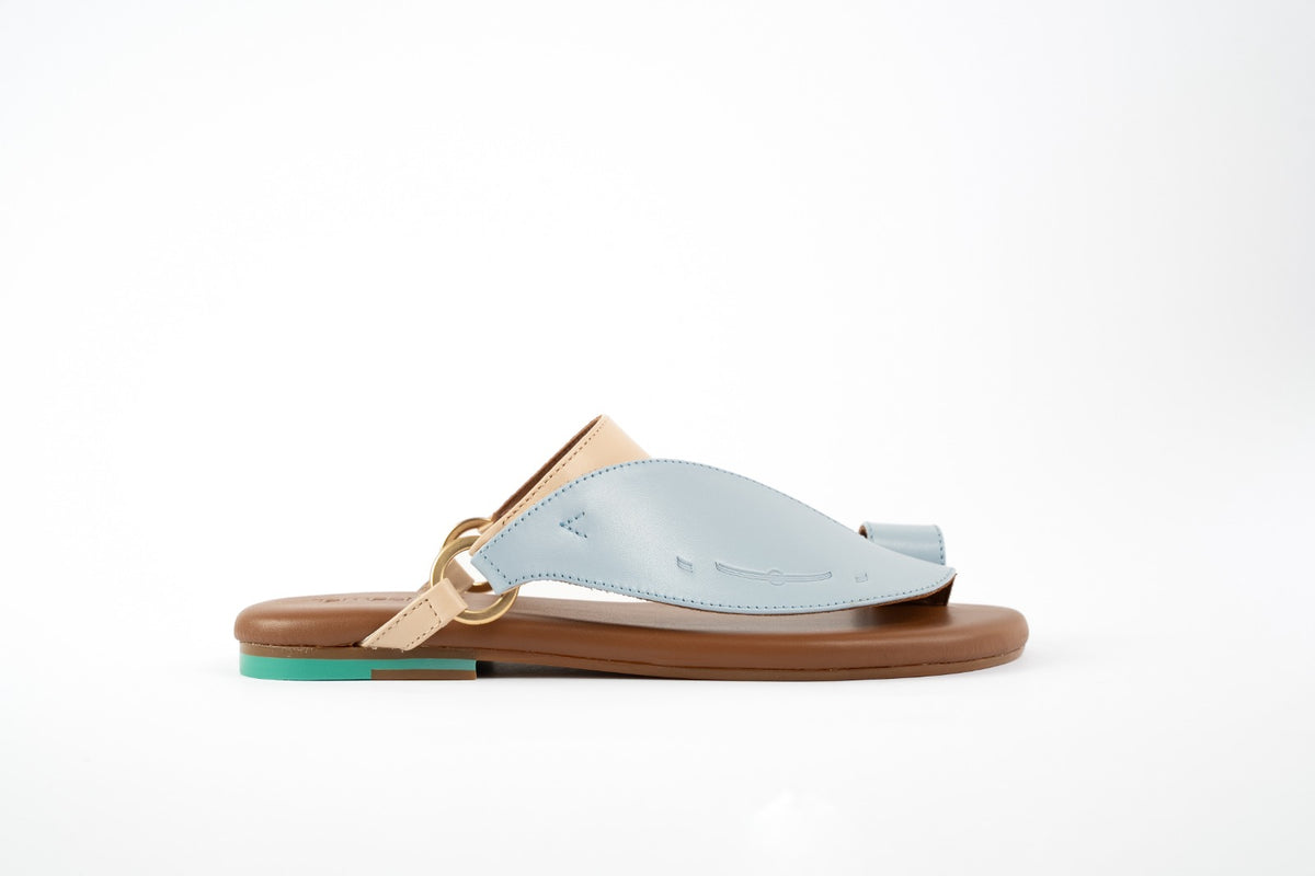 Side View of Talaheeq Women Sandals|Cow Leather Sandals For Women Stylish Arabic Flat Sandals|Talaheeq cow leather mix of natural and light blue color|Talaheeq cow leather mix of natural and light blue color|Upper View of Talaheeq Sandals For women|Highli